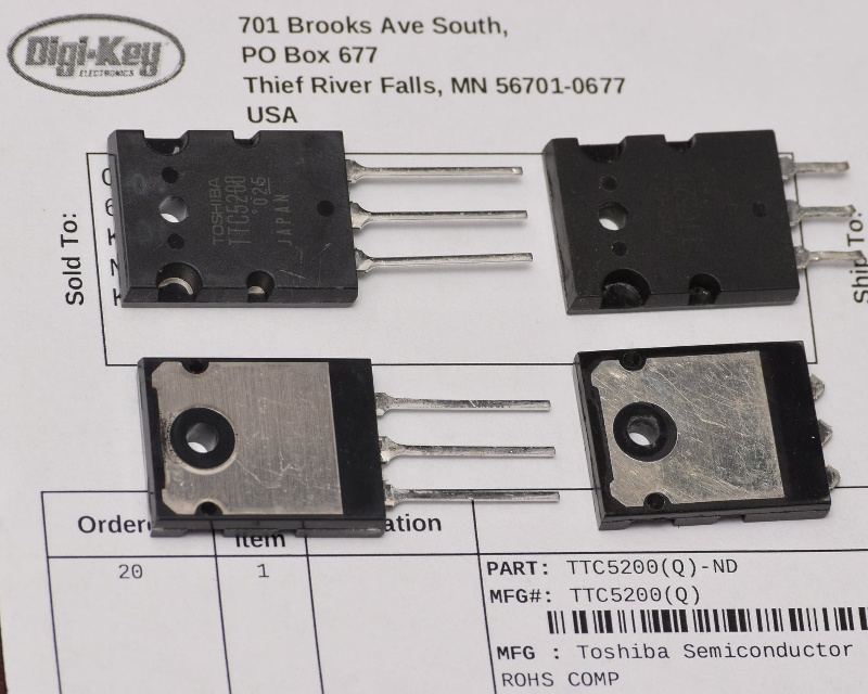 genuine transistors (Toshiba TTC5200) next to counterfeit on receipt for genuine